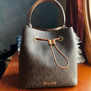 Michael Kors bucket bag, never used, with tags! Brown espresso color